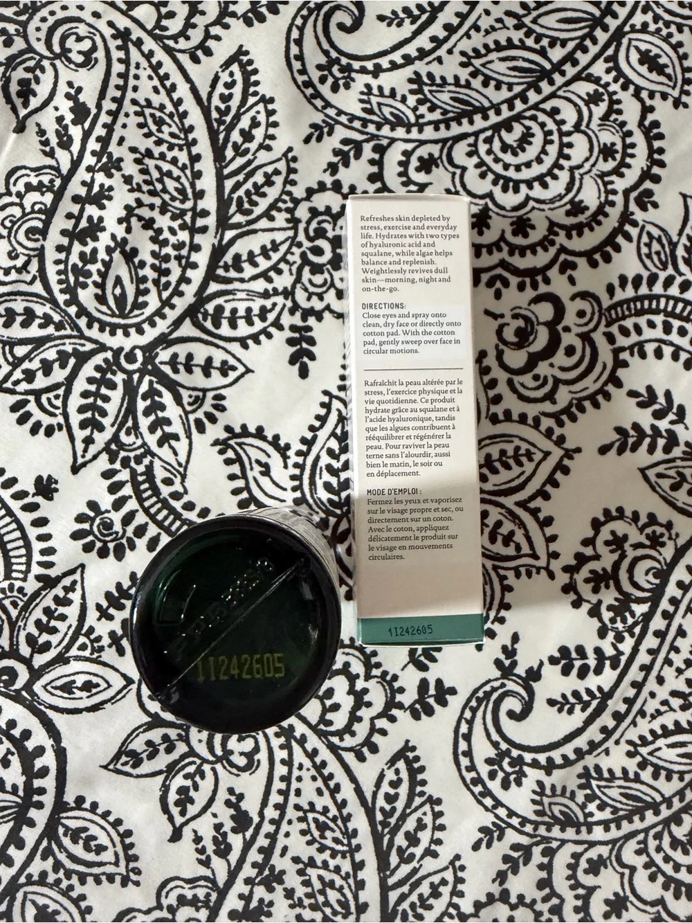 Biossance Toning Mist and pouch
